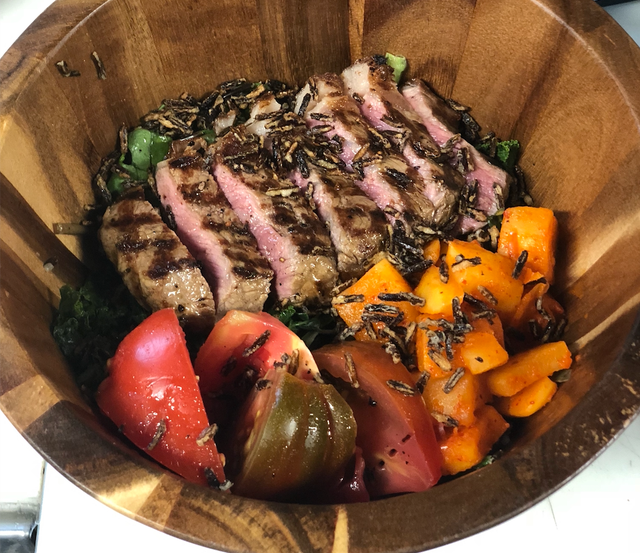 ribeye with tomatoes and wild rice