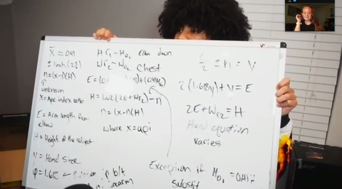 kenyon lee shows some of his equations for calculating height on a whiteboard