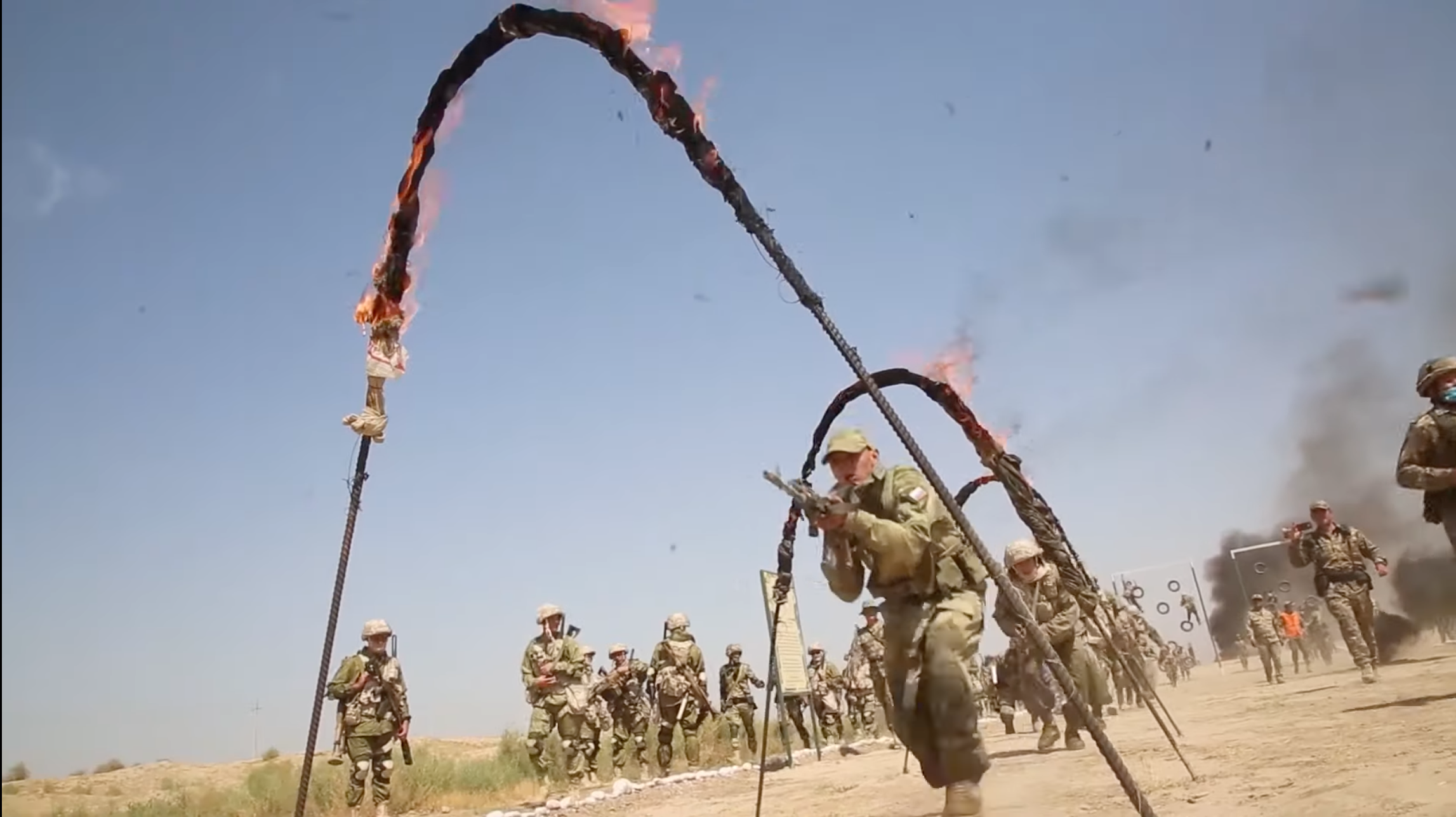 Watch Russian Troops Leap Through ... Flaming Croquet Wickets