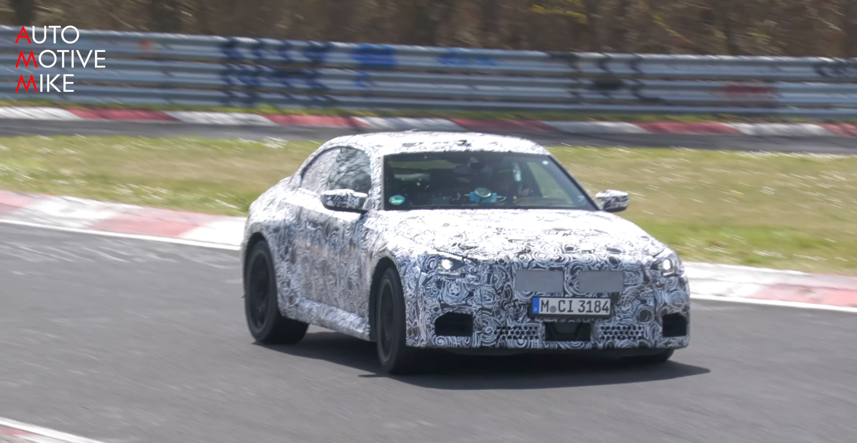 Watch This New BMW M2 Test Mule Fly Around the Nürburgring