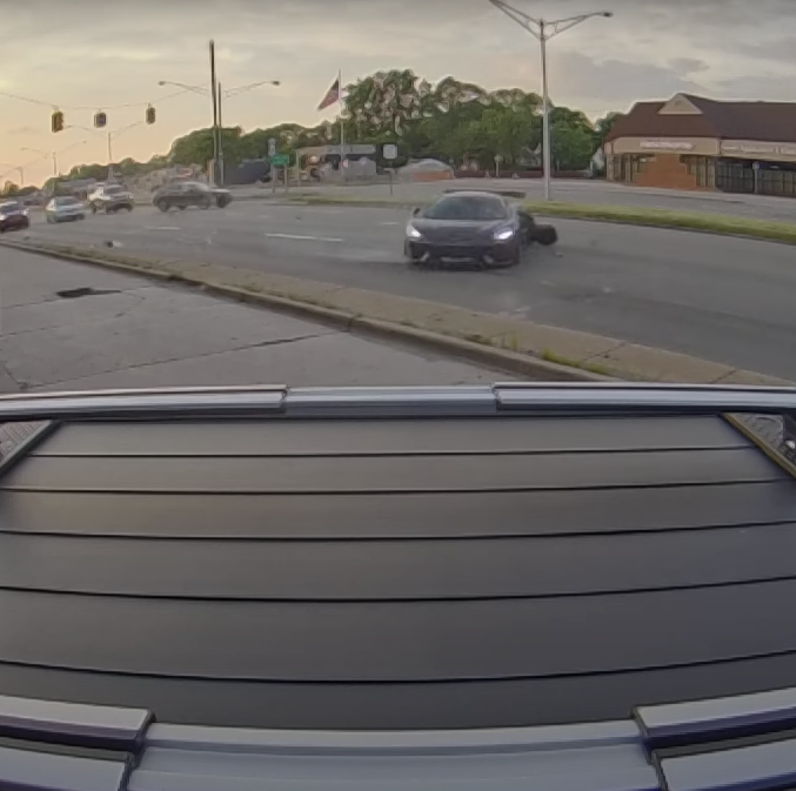 Watch a Honda SUV Smash Into a McLaren 570s on Woodward Ave