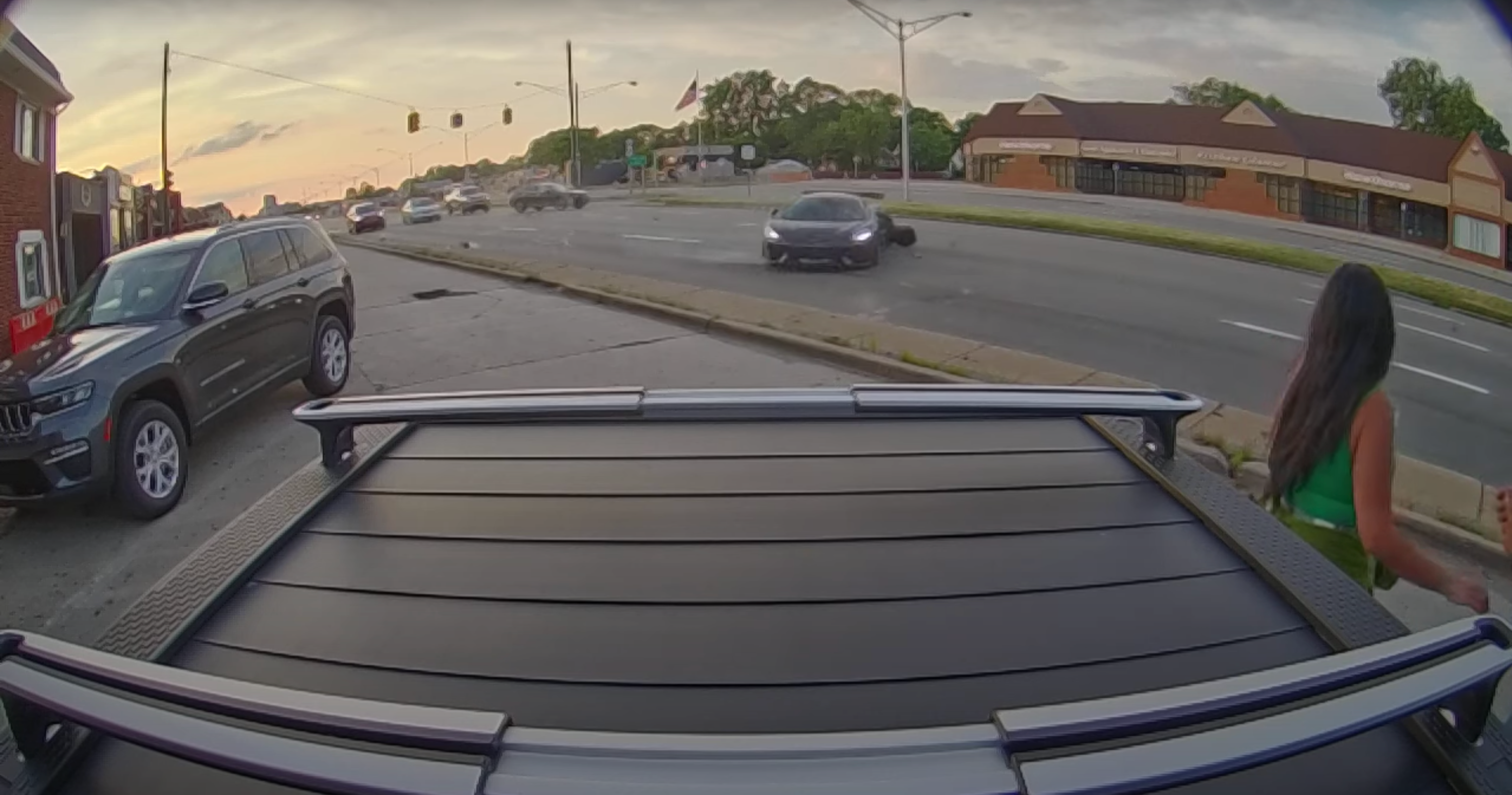 Watch a Honda Driver Smash Into a McLaren 570s on Woodward Ave