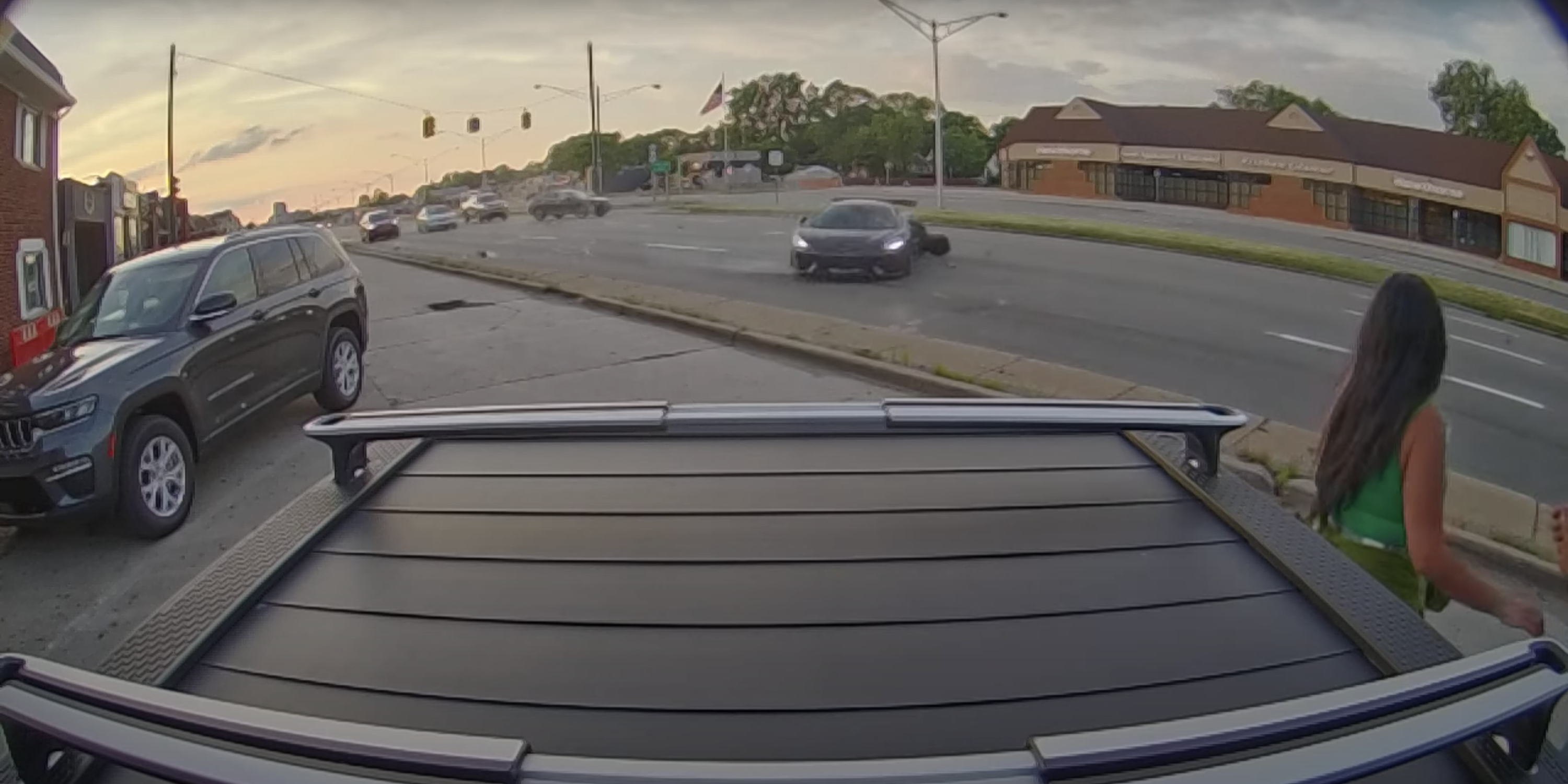 Watch a Honda Driver Smash Into a McLaren 570s on Woodward Ave