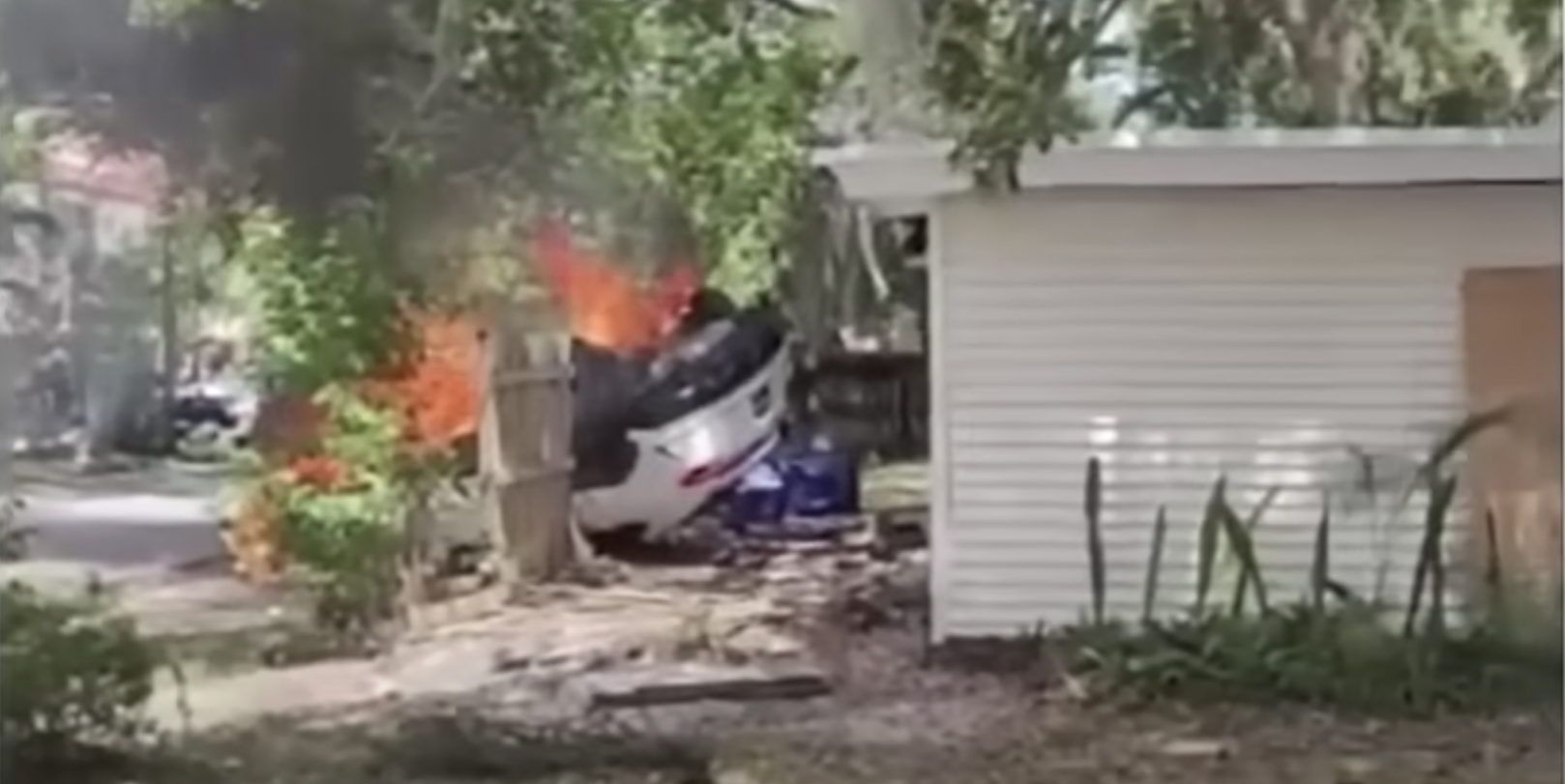 Video Shows Lamborghini Urus Speed Through Stop Sign, T-Bone Car, Fly Into Roof of Home, Catch Fire