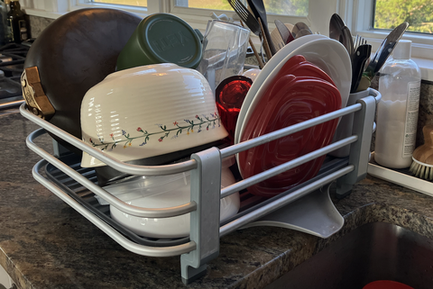 dish rack full of dishes
