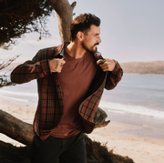 guy wearing overshirt by the beach
