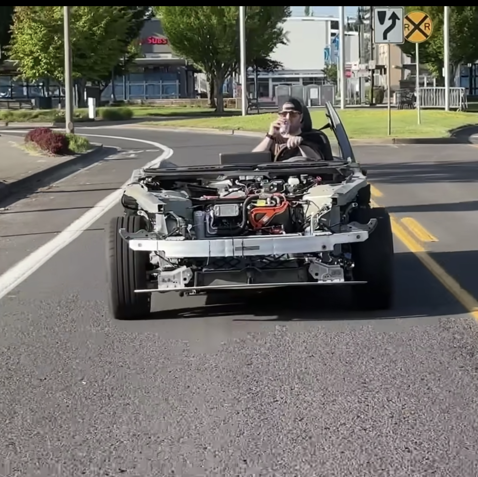 Ripping the Body Off a Tesla Model 3 Makes It Way Faster