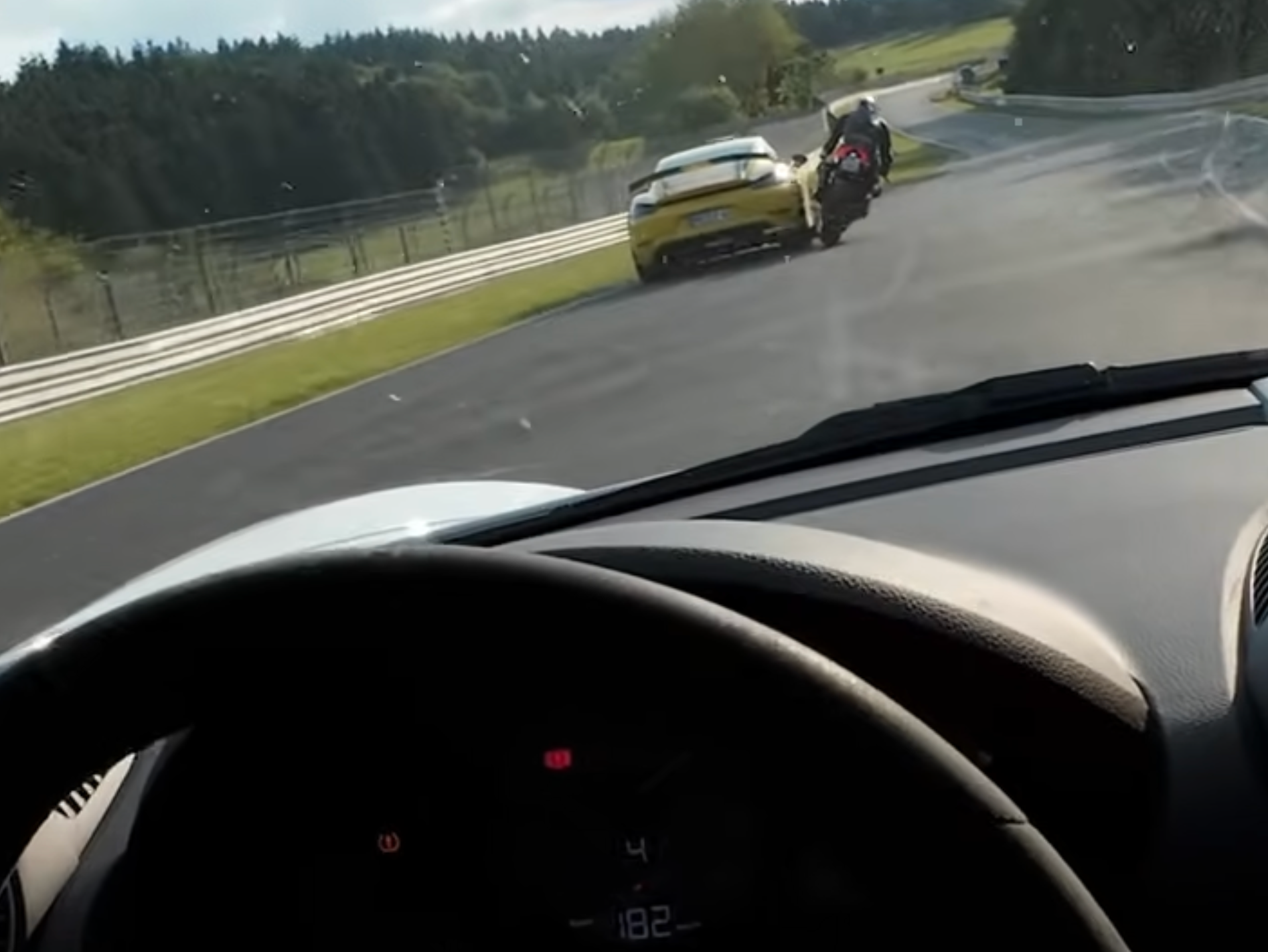 This Porsche Cayman GT4 RS's Near-Miss with a Ducati on the Nürburgring Is Terrifying