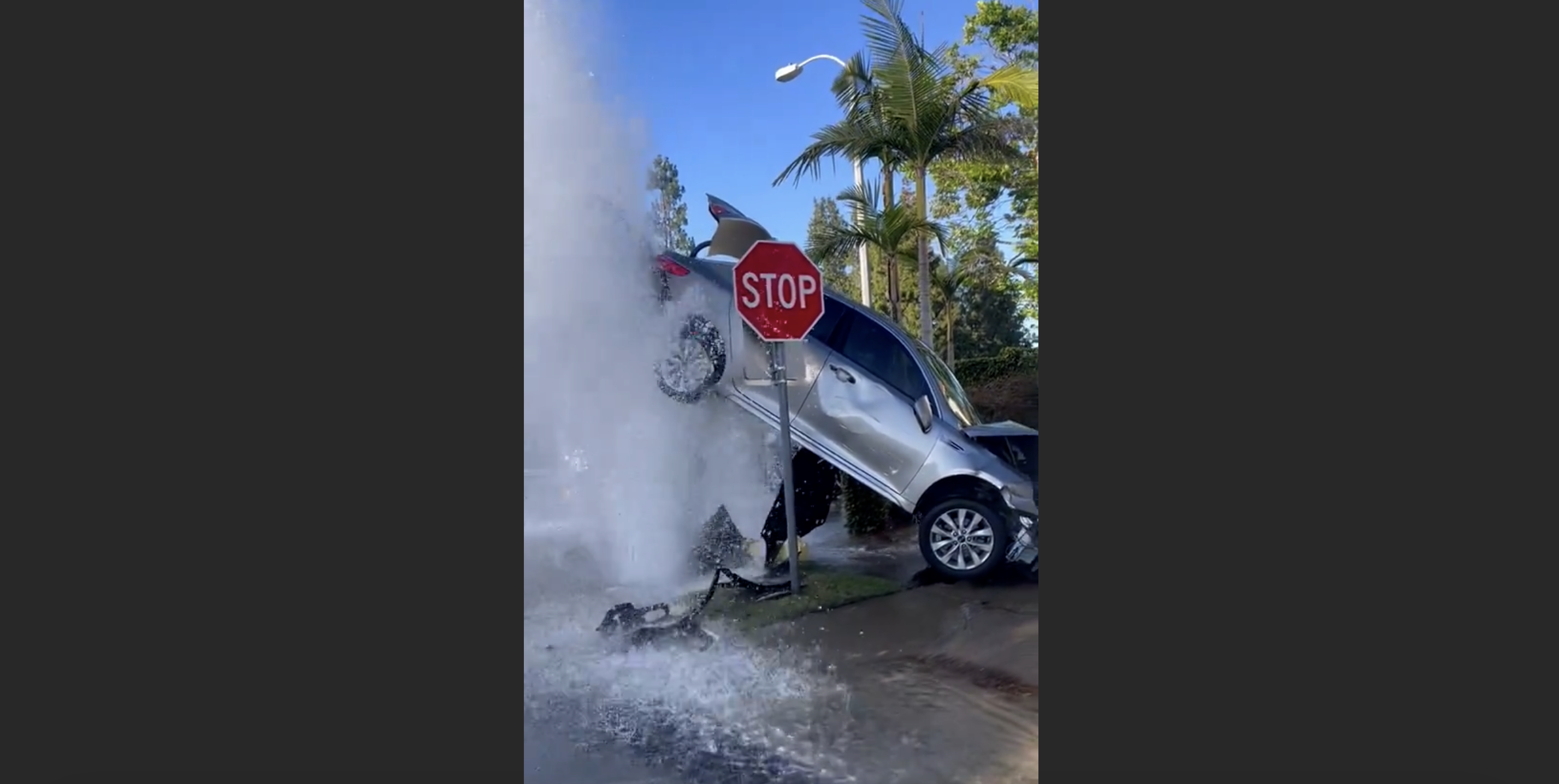 Car Crash Leaves Sedan Floating Atop Fire Hydrant Geyser