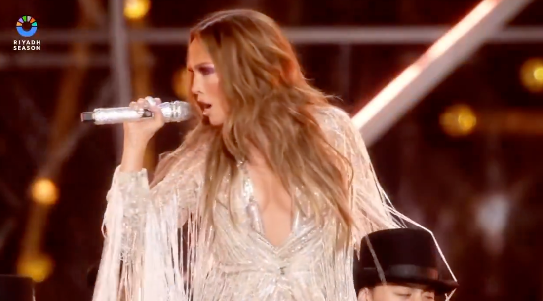 J.Lo Shimmers in a Bodysuit and Cape While Performing at Elie Saab’s Fashion Show