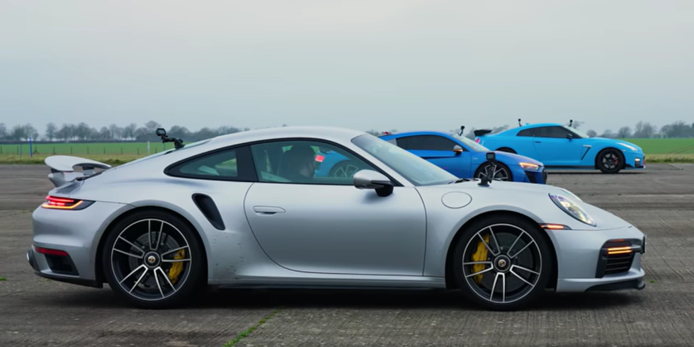 Watch the 911 Turbo S beat more competitors in a drag race