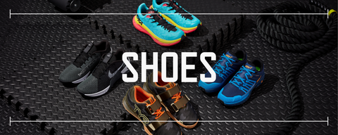4 pairs of fitness shoes in various colors laid out on black rubber gym flooring with text saying shoes laid over top the photo