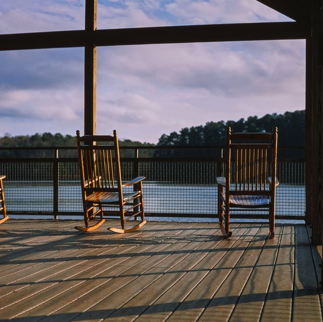 peaceful lakeside rocking chairs by the water in the summer even in raleigh, nc, united states