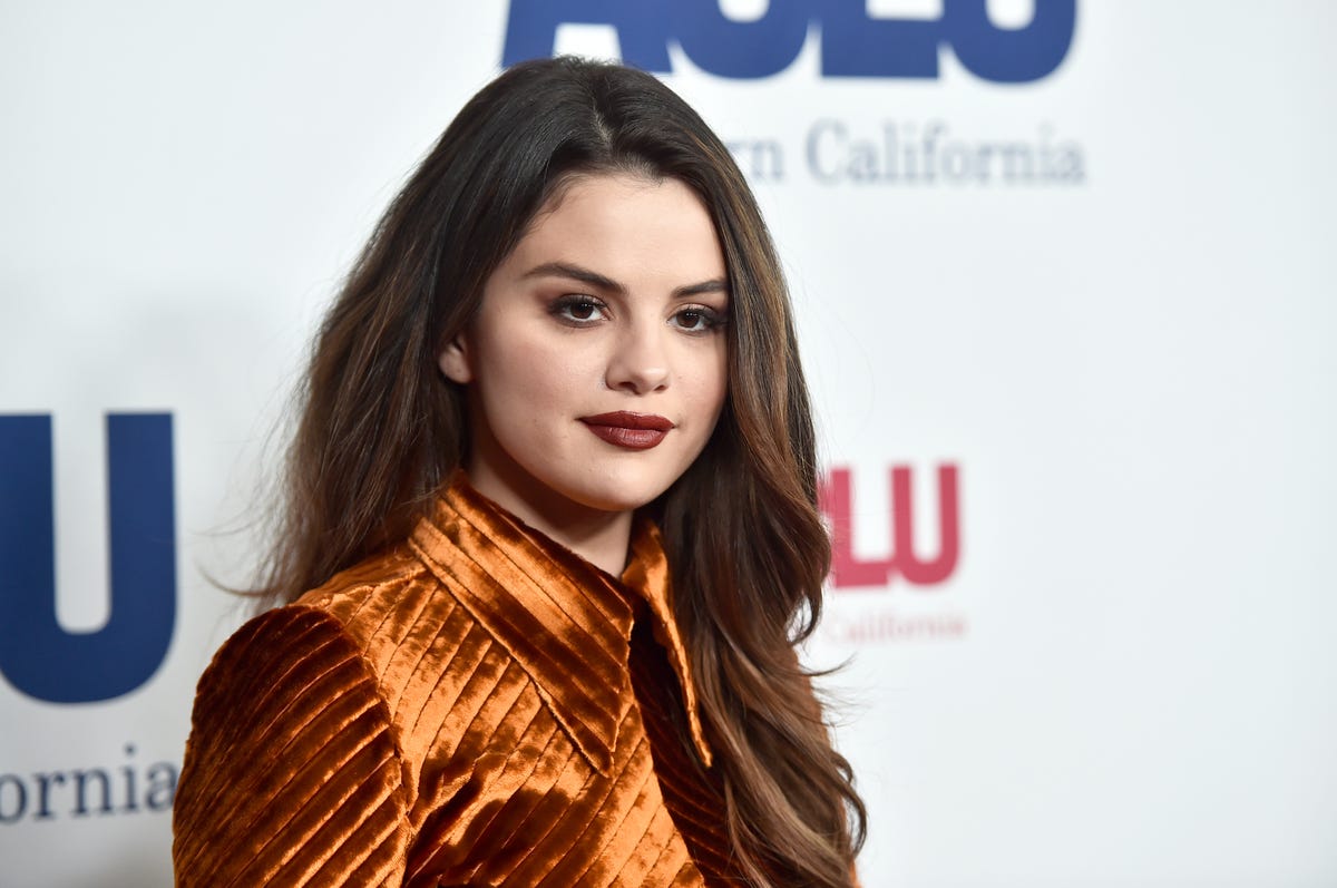 Selena Gomez Wore a Burnt Orange Prada Dress to the ACLU's Bill of