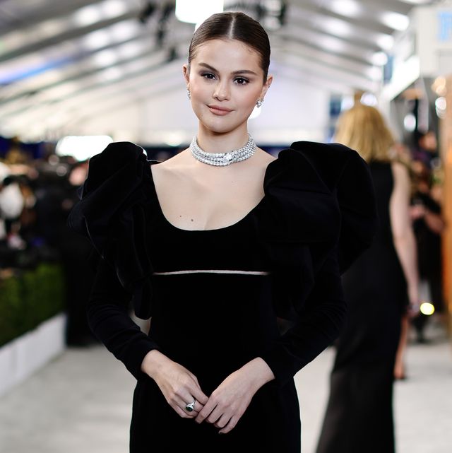 selena gomez in a black dress and diamonds at the 2022 sag awards red carpet
