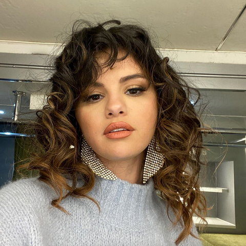 Selena Gomez Wore Crystal Prom Earrings With A Sweater