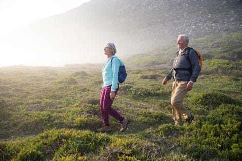 Senior couple walking outdoors together