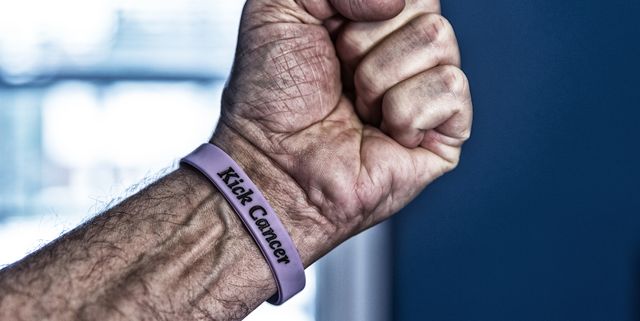 senior man cancer patient hand making a fist