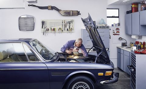 Senior Man Working on His Car