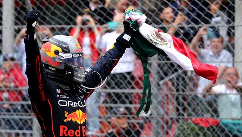 sergio perez of red bull racing  celebrates after winning