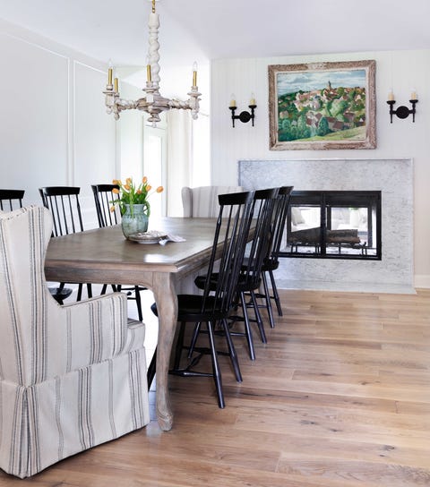 dining room, antique dining table, black dining chairs, fireplace