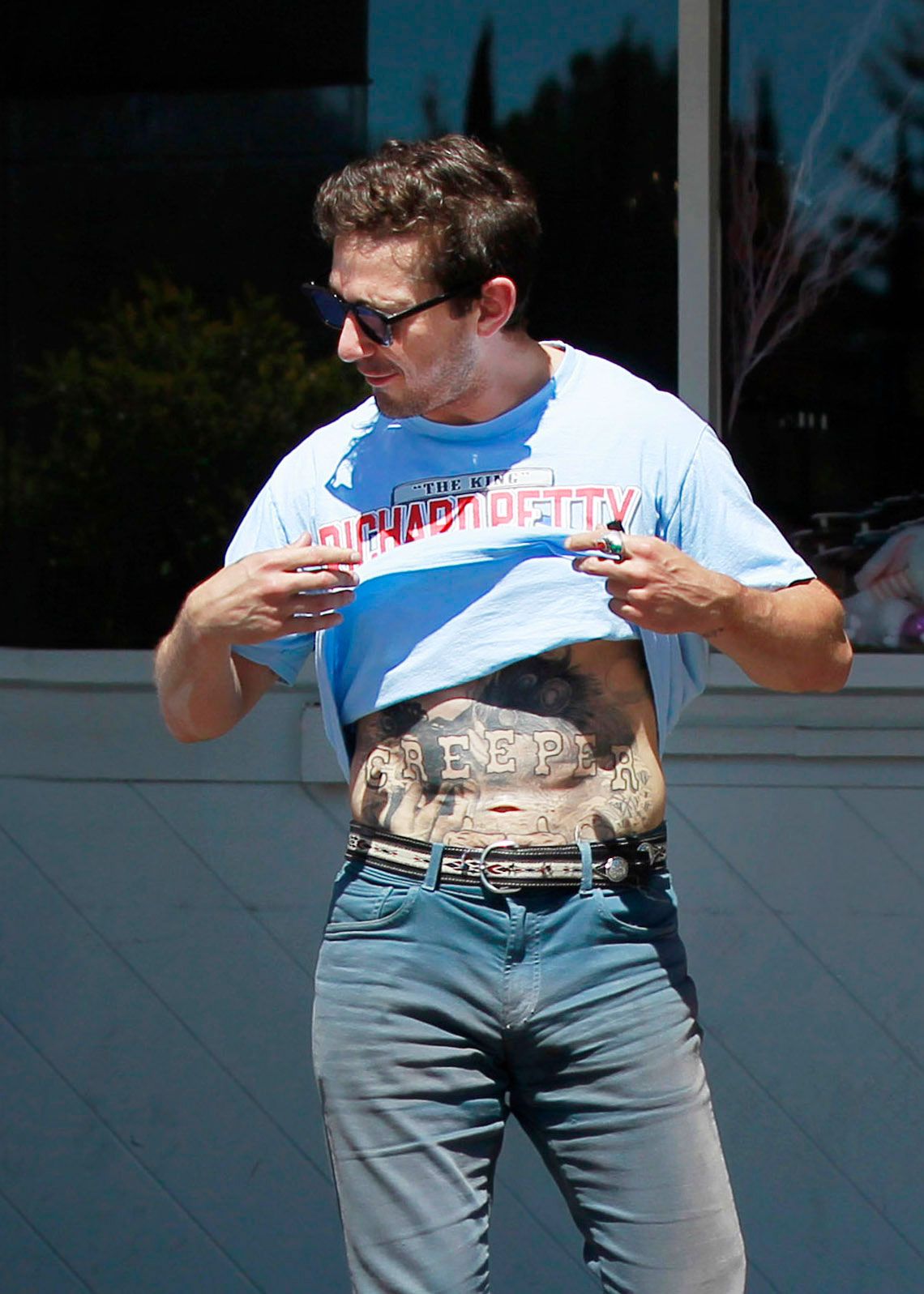 Shia Labeouf S Tattoo Says Creeper Across His Stomach And It S Perfect