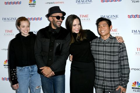 angelina jolie, shiloh, pax, and jr at the premiere of paper and glue