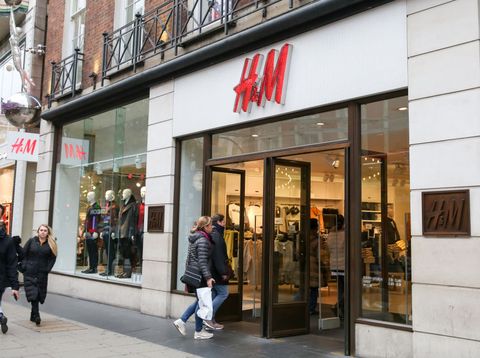 Shoppers are seen outside H&M store on London's Oxford...