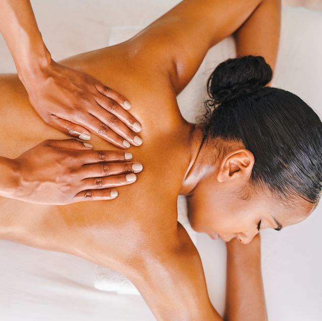 shot of an attractive young woman getting a massage at a spa