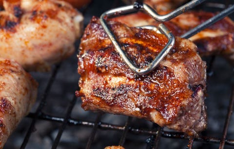 Barbecuing meat Barbecuing meat