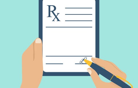 Doctor writing a prescription Doctor writing a prescription