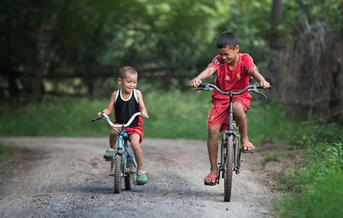 kids on bikes in thailand