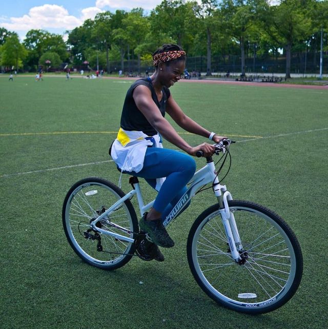 simone tchouke riding a bike
