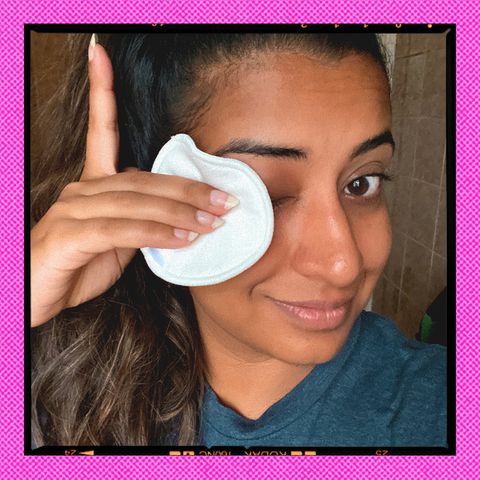 hanna ibraheem swiping eye makeup off with a cotton pad