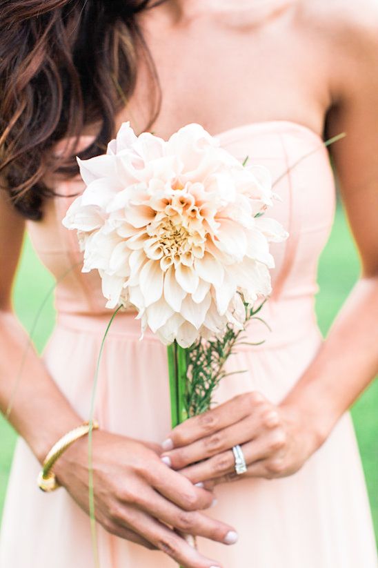 bridesmaids with single flower