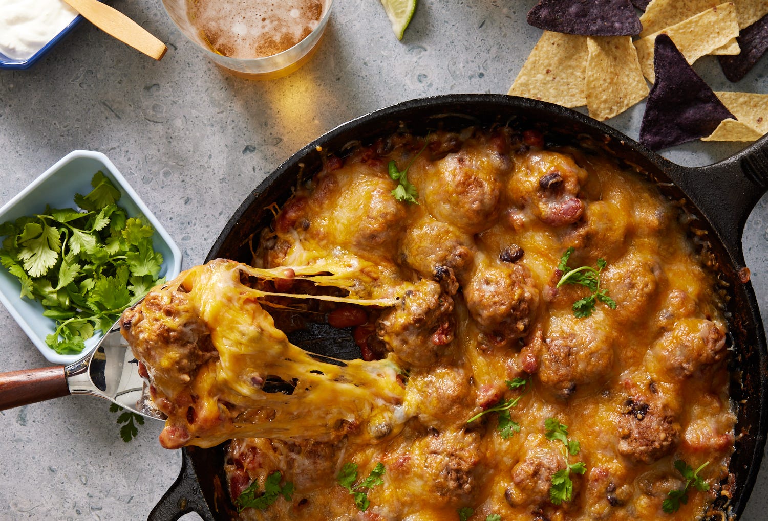 This Skillet Chili & Meatballs Is Perfect For Fall Dinners, Tailgates, & More