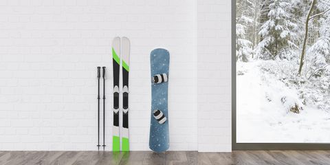 Skis and snowboard at a wall with view to winter landscape, 3d rendering