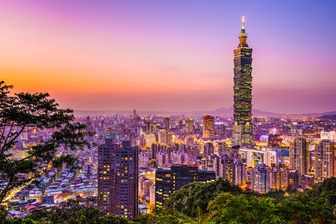 skyline view of taipei glowing in the sunset light