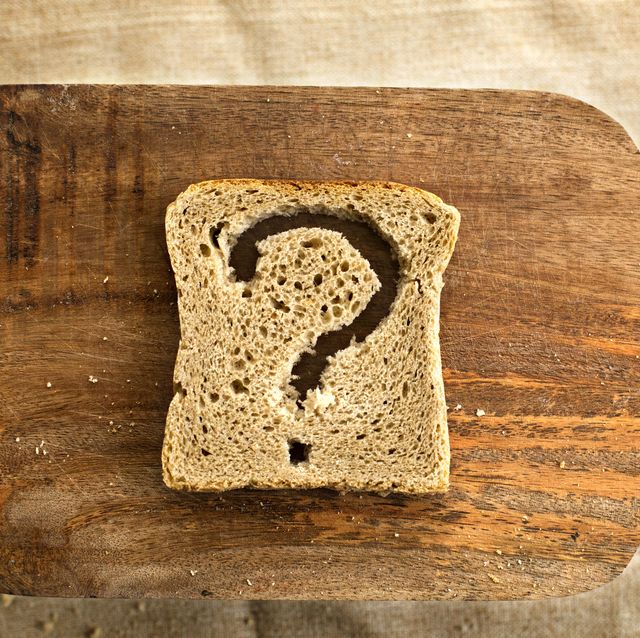 A slice of bread toast with a question mark