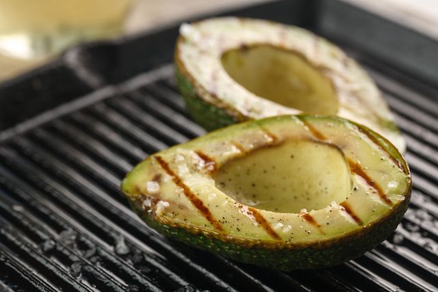 sliced fresh avocado on the grill health food barbeque avocado