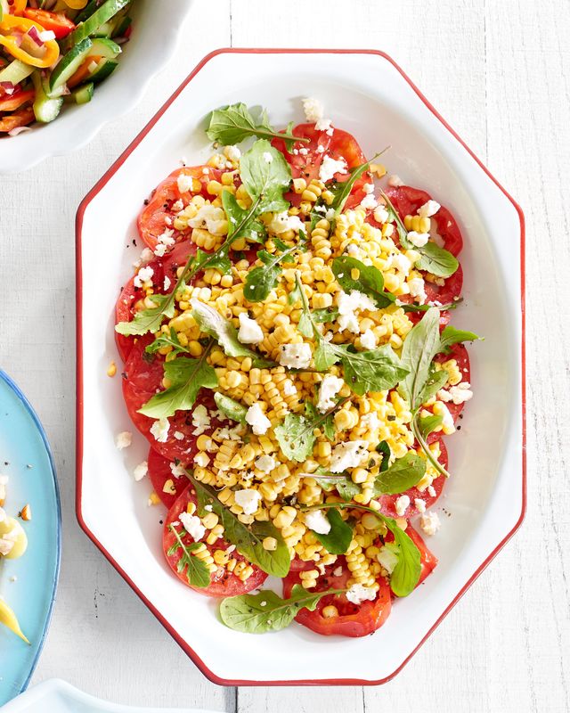 sliced tomatoes with corn and feta