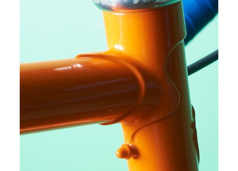 Yellow, Orange, Liquid, Amber, Colorfulness, Bicycle accessory, Tan, Teal, Close-up, Material property, 