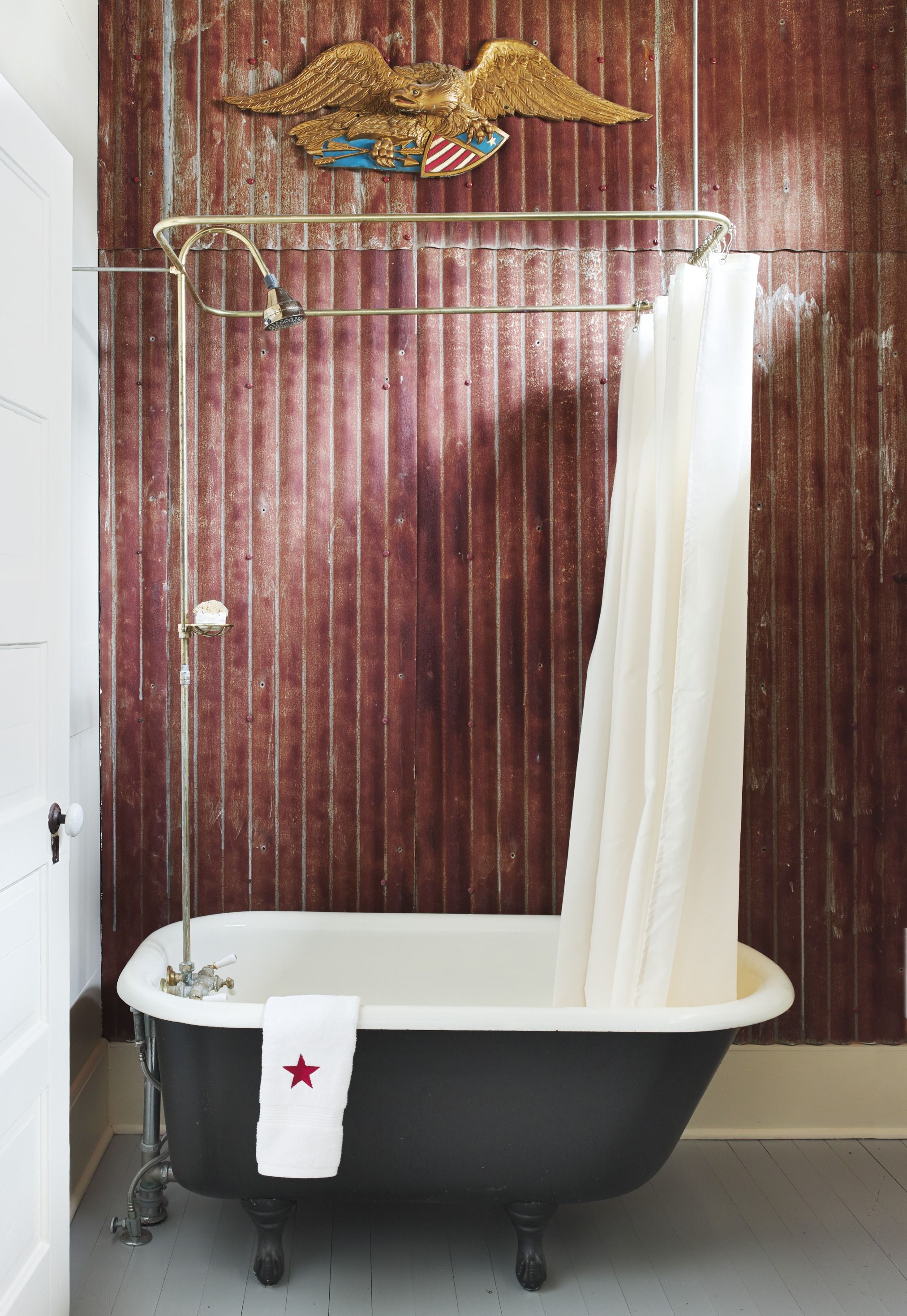 bathroom with clawfoot tub and shower