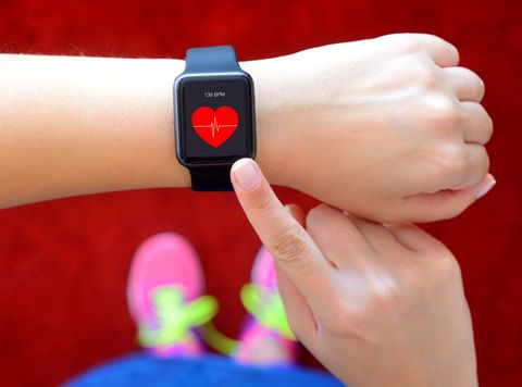 Smart watch displaying heart rate while exercising