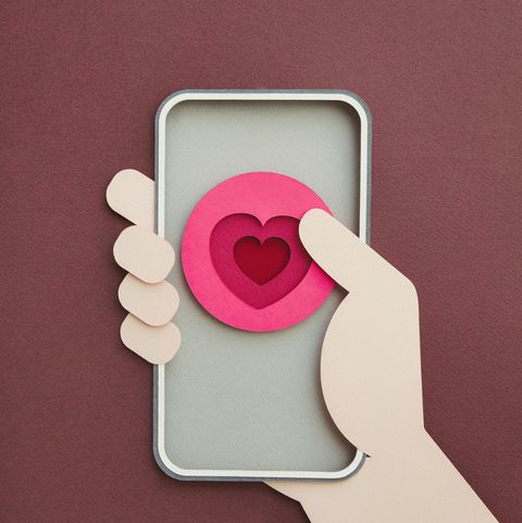 smartphone with heart shape on screen