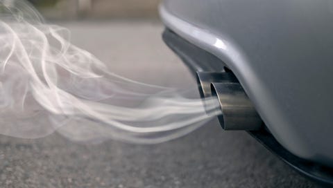 smoky exhaust pipes from a starting diesel car