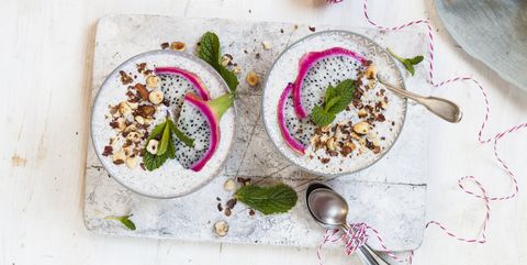 Smoothie bowls with dragon fruit, chia seeds and roasted hazelnuts
