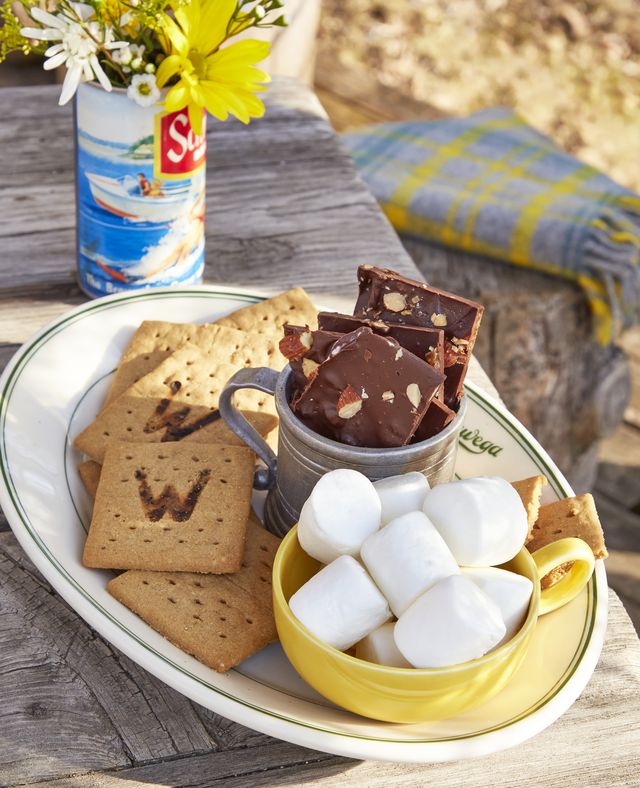 toffee s’more ingredients on a plate including branded crackers marshmallows and chocolate