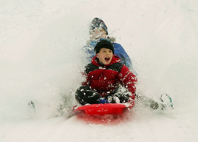 croton on hudson, new york   january 28  simon sharpe, 11, and his mother, corrinne collett, both of croton on hudson, new york ride a sled together at the croton gorge dam park january 28, 2004 in croton on hudson, new york more than a foot of snow fell in some parts of the northeast but the snow came with warmer temperatures and many took advantage of the snow day to enjoy the wintry weather  photo by robert a sabogetty images