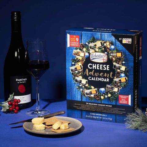 cheese advent calendar with wine and cheese on table
